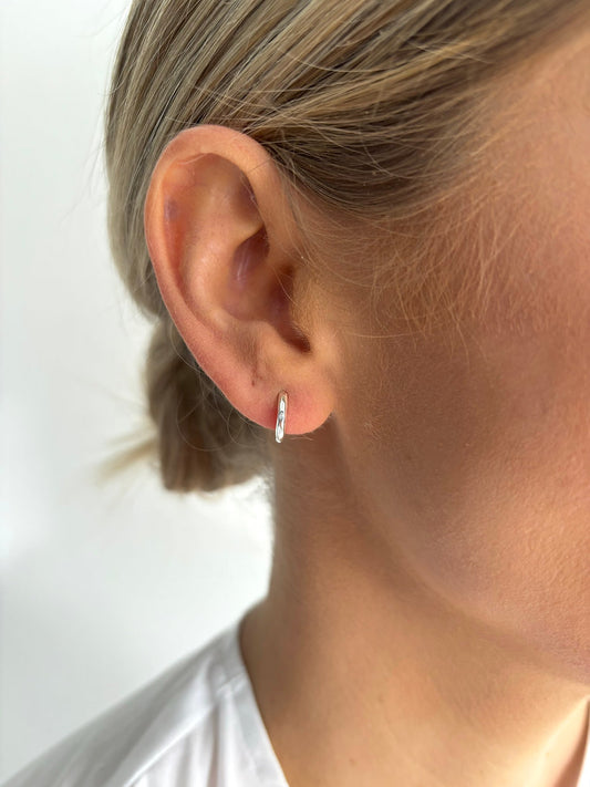 The Hammered Huggie in Silver