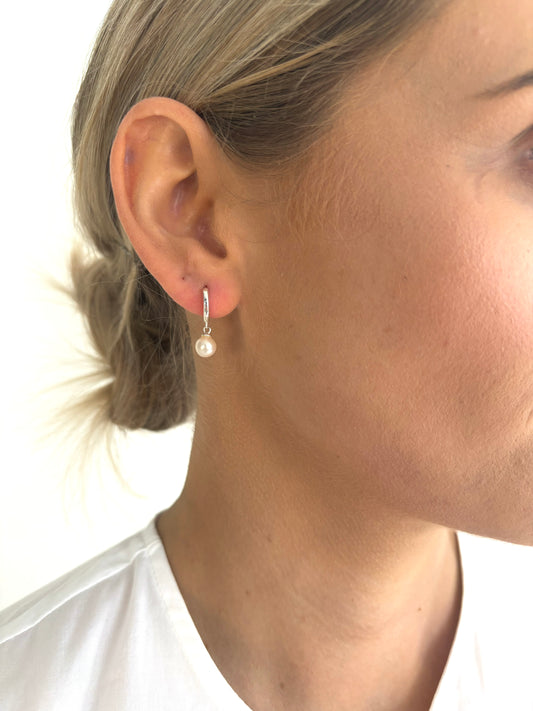 The Pearl Huggie in Silver image 1